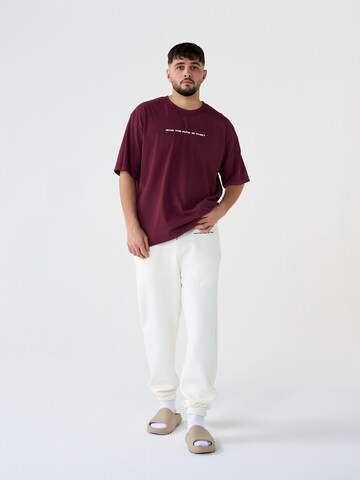 ABOUT YOU x Dardan - Loosefit Pantalón 'Sammy' en blanco