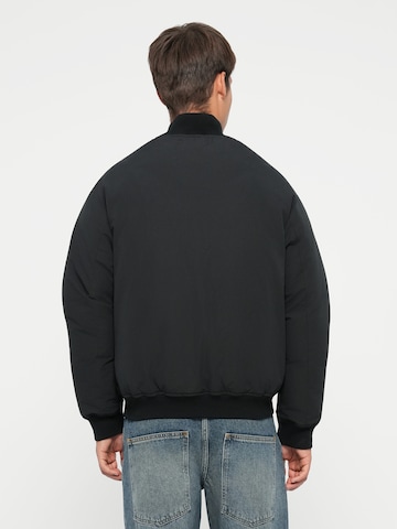 JACK & JONES Prehodna jakna 'JCOAURA' | črna barva