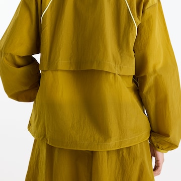 new balance - Chaqueta deportiva 'Sport Legacy Jacket' en amarillo