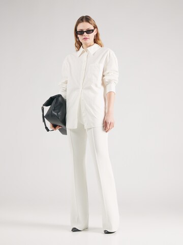 Wide leg Pantaloni di REMAIN in bianco