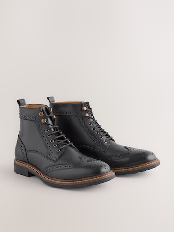 Boots stringati di Next in nero