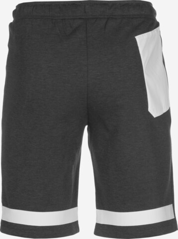 NIKE Regular Workout Pants in Grey