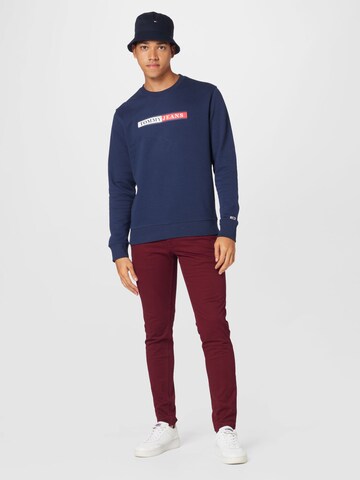 Tommy Jeans - Slimfit Pantalón chino 'Scanton' en rojo