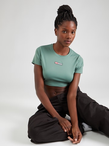 Reebok Performance shirt in Green