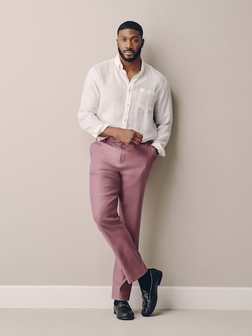 Slimfit Pantaloni con piega frontale di Next in rosa