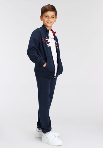 Champion Authentic Athletic Apparel Tracksuit in Blue