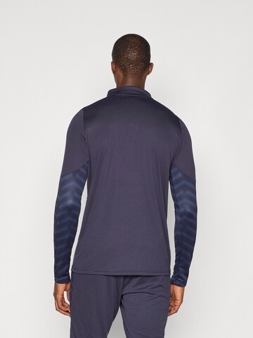 T-Shirt fonctionnel 'Individual CUP' PUMA en bleu