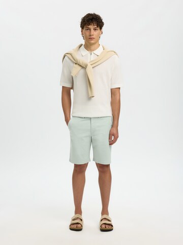 Coupe slim Pantalon chino 'SLHMILES' SELECTED en bleu