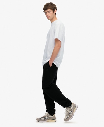 Effilé Pantalon Superdry en noir : devant
