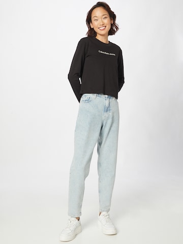 Calvin Klein Jeans Дънки Tapered Leg Дънки в синьо