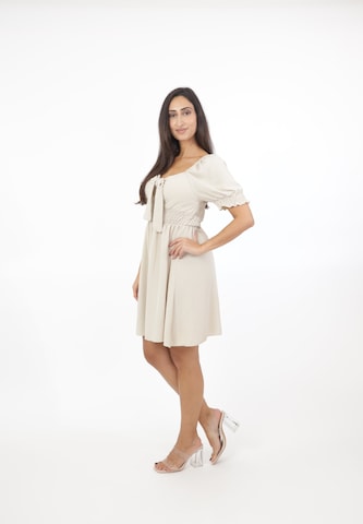 Abito di Elara in beige