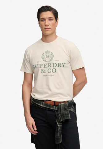 Superdry & Co T-shirt '1954 Company' i beige: framsida