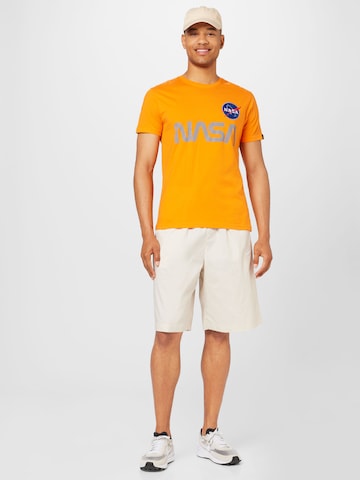 ALPHA INDUSTRIES Majica 'NASA' | oranžna barva