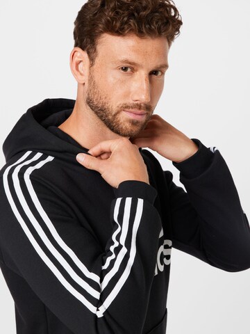 juoda ADIDAS SPORTSWEAR Sportinio tipo megztinis 'Essentials'