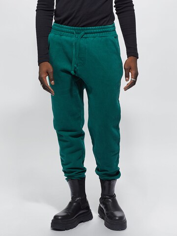 Young Poets Tapered Trousers 'Maleo' in Green: front