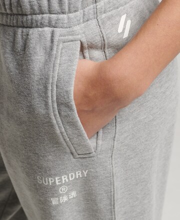 Superdry Ozke Hlače | siva barva