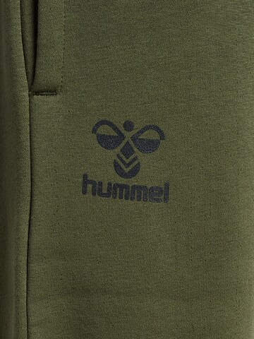 Effilé Pantalon de sport 'ACTIVE' Hummel en vert