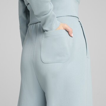 PUMA Loosefit Sportbroek 'Classics' in Groen