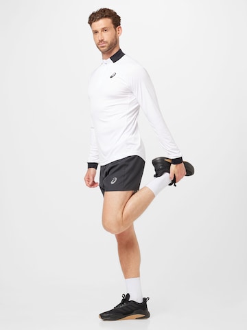 ASICS Normalny krój Spodnie sportowe 'Core 5IN' w kolorze szary