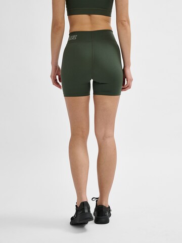 Skinny Pantaloni sport 'Fundamental' de la Hummel pe verde