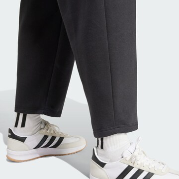 ADIDAS SPORTSWEAR Loosefit Παντελόνι φόρμας 'Essentials' σε μαύρο