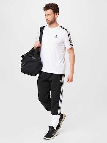 ADIDAS ORIGINALS Zúžený strih Nohavice - Čierna