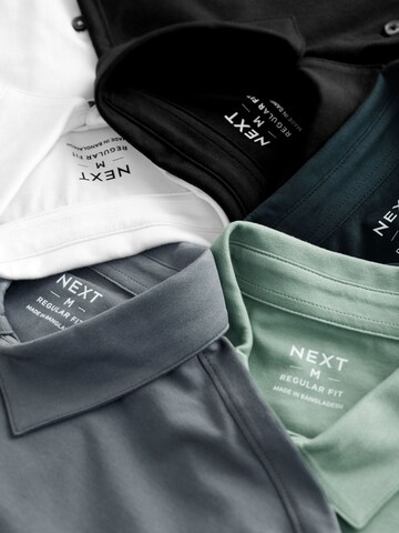 Next - Camiseta en azul