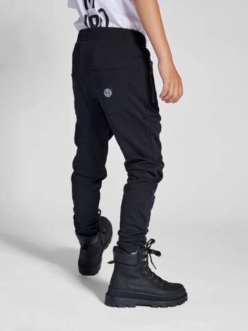 SOMETIME SOON Tapered Trousers in Black
