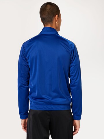 Champion Authentic Athletic Apparel Tracksuit in Blue