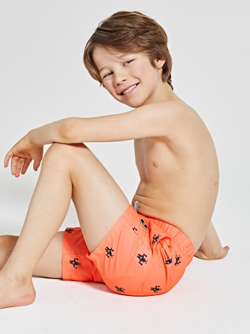 Shorts de bain Shiwi en orange : devant