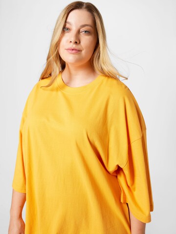 Public Desire Curve T-shirt i orange