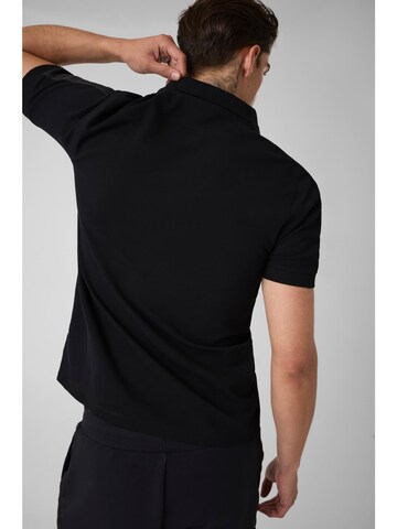 GUESS Poloshirt in Schwarz