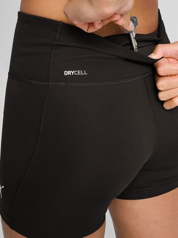 PUMA Skinny Sports trousers 'TAD Essential' in Black