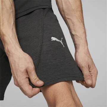 Regular Pantaloni sport de la PUMA pe negru