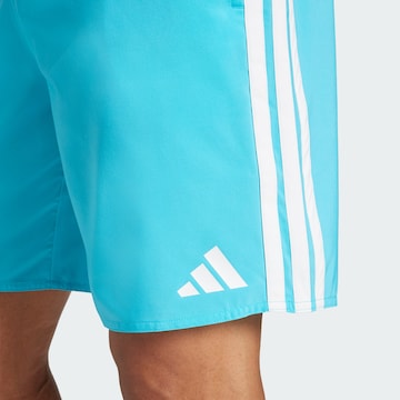 ADIDAS SPORTSWEAR - Calções de banho desportivos em azul