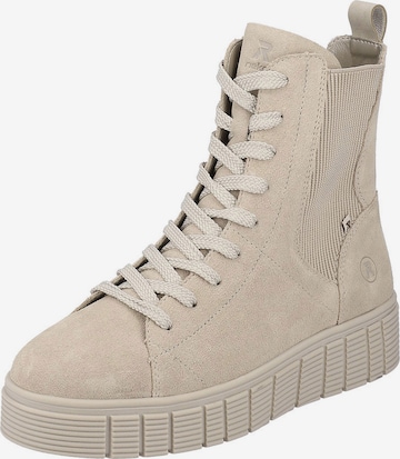 Rieker EVOLUTION - Botines con cordones en beige: frente