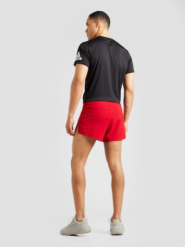 regular Pantaloni sportivi 'Adizero Essentials' di ADIDAS PERFORMANCE in rosso