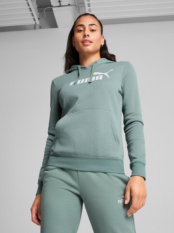 PUMA Sports sweatshirt 'Ess No. 1' in Green: front