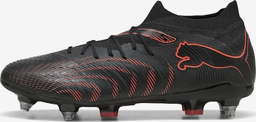 Chaussure de foot PUMA en noir : devant