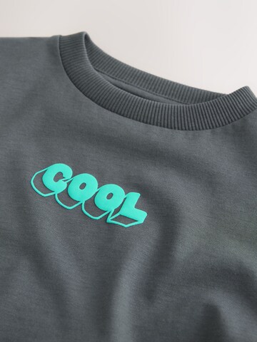 T-Shirt Next en gris