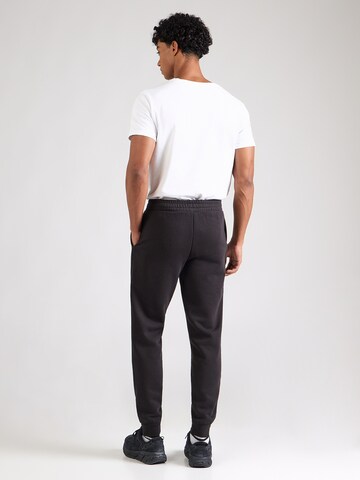 PUMA Tapered Sportbroek 'ESS No. 1' in Zwart