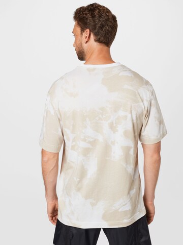 T-Shirt fonctionnel Reebok en beige