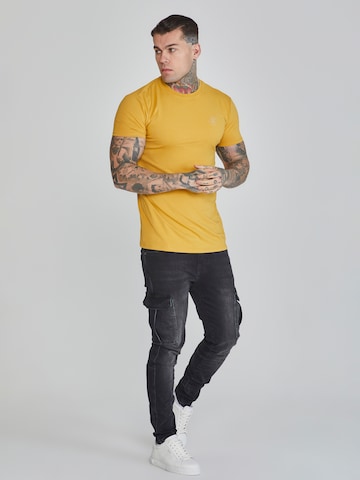 Maglietta di SikSilk in giallo