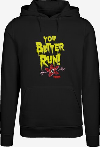 F4NT4STIC Sweatshirt 'Stranger Things You Better Run Netflix TV Series' in Zwart: voorkant