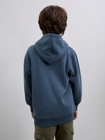 Sweat-shirt ' ' Scalpers en bleu