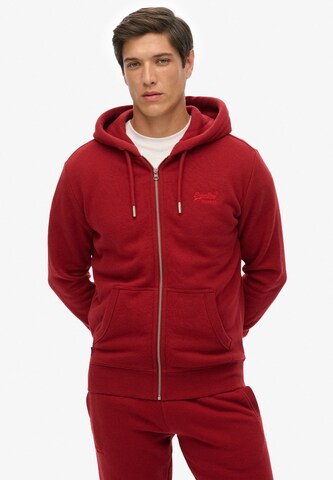 Veste de survêtement Superdry en rouge : devant