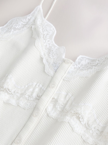 balta Next Palaidinė be rankovių