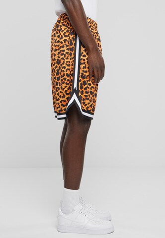Loosefit Pantalon Urban Classics en orange