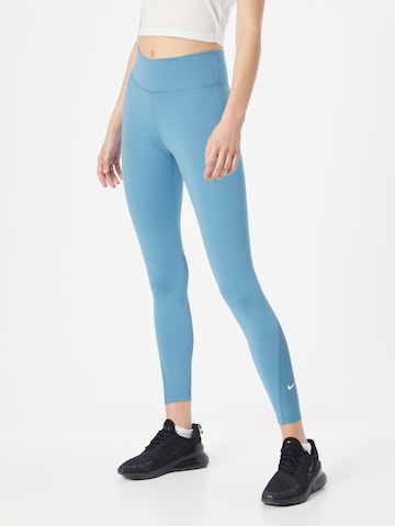 NIKE Sports trousers in Blue: front