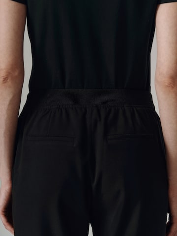 TATUUM - regular Pantalón en negro